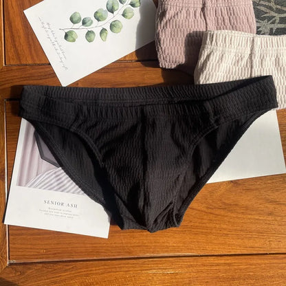 Men's solid colour pure cotton triangle underwear briefs on a mid-waist fit model