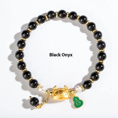 Natural agate and crystal bracelet with 8mm diamond-cut beads on a wrist.