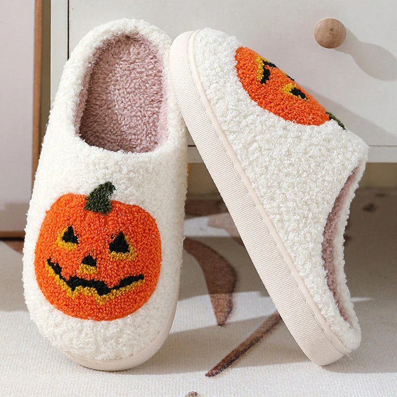 Cozy pumpkin cartoon slippers with soft suede uppers and plush cotton linings for comfortable indoor wear