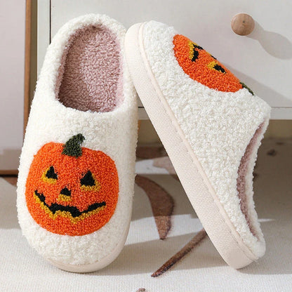 Cozy pumpkin cartoon slippers with soft suede uppers and plush cotton linings for comfortable indoor wear