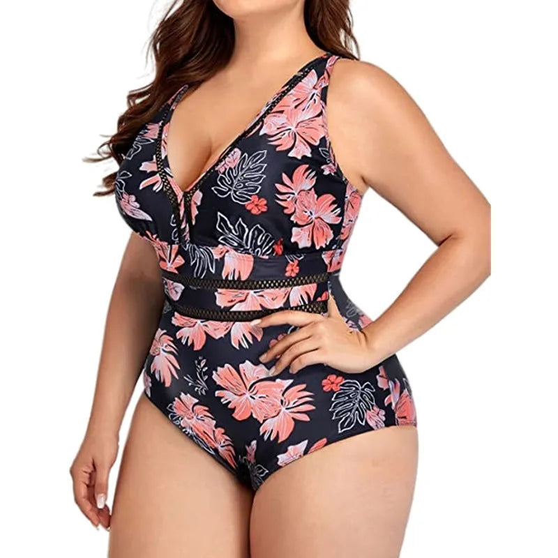 Black plus size bikini swimsuit with print design for women, shown on a hanger.