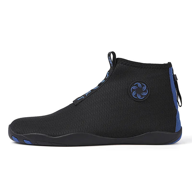Mid-top outdoor beach shoes in black and fluorescent green with mesh upper and rubber sole.