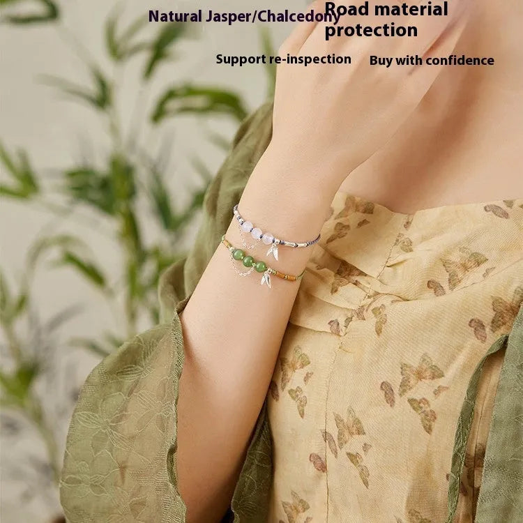 Hetian jade chalcedony bracelet with woven strap in diamond design with lotus detail