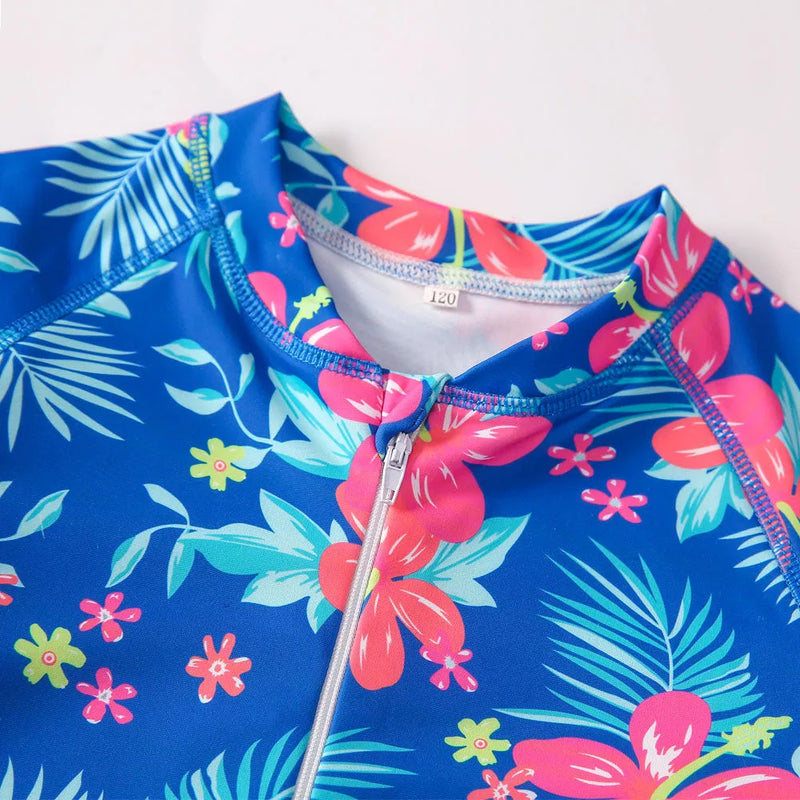 Girl's long-sleeve one-piece swimsuit briefs for swimming and wading, polyester fabric with polyester fibre lining, available in sizes 100cm, 110cm, 120cm, 130cm, 140cm, 150cm for female children.