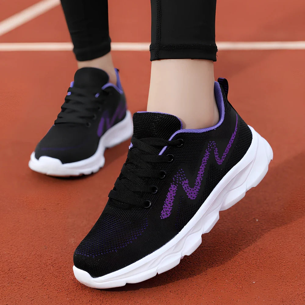 Women's black mesh running shoes with cross-strap and 3-5cm wedge heel, fabric upper with sewing details