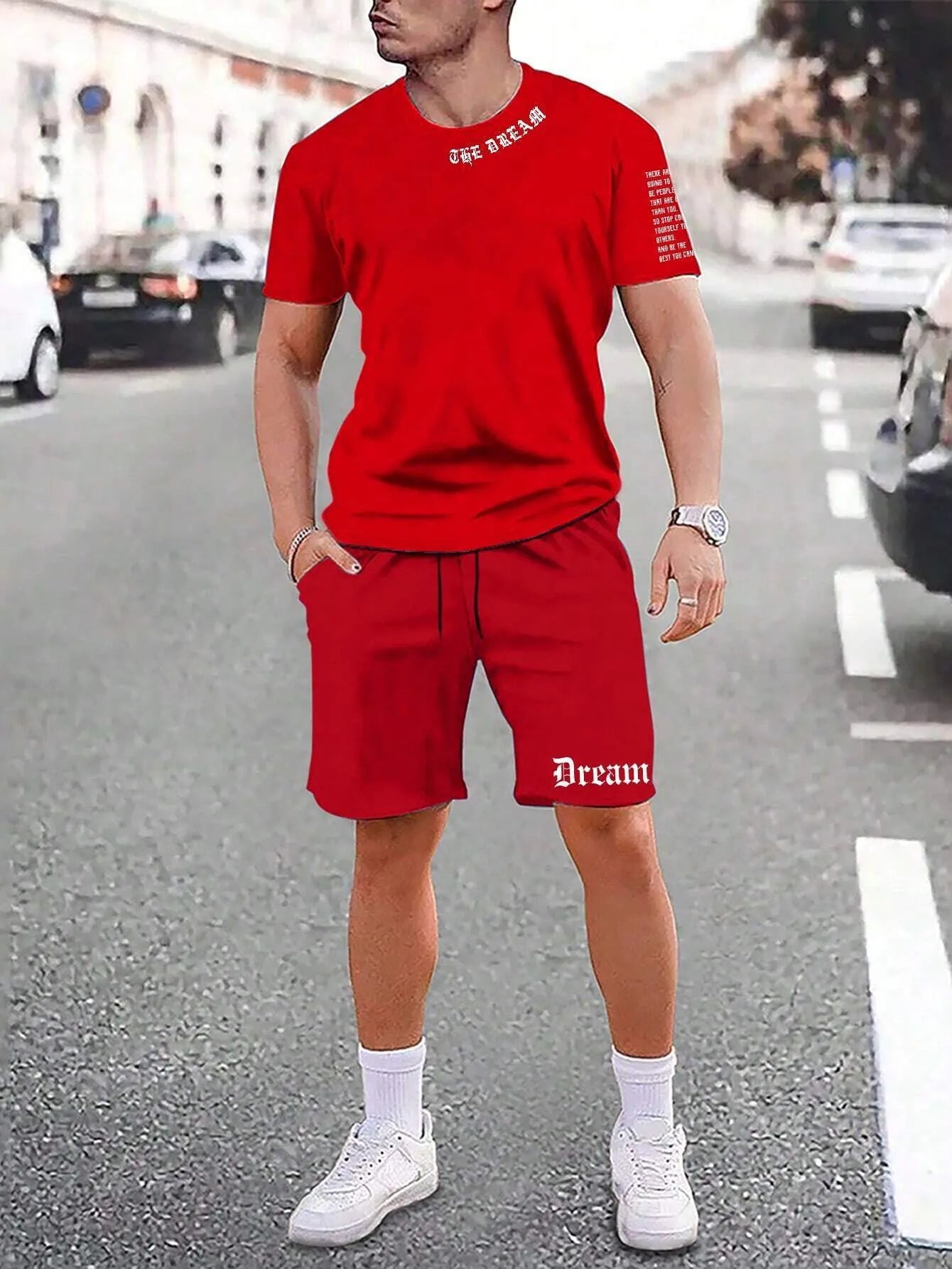 Man wearing a printed short-sleeve sports top and matching shorts in a quick-dry polyester blend.