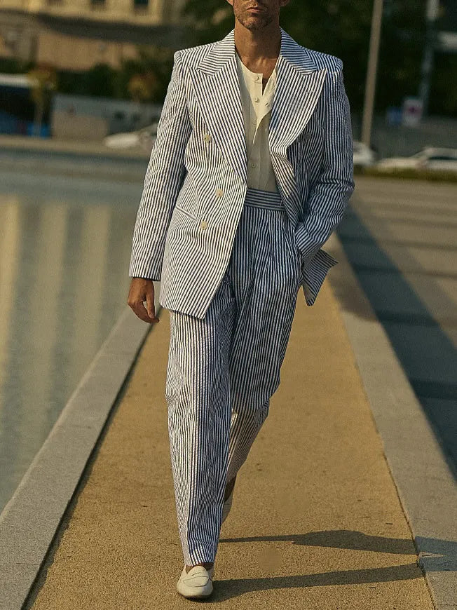 Blue and white striped two-piece suit set with matching blazer and trousers