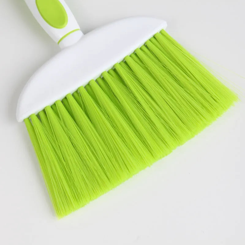 Small plastic handheld dustpan and brush cleaning kit in assorted colours.