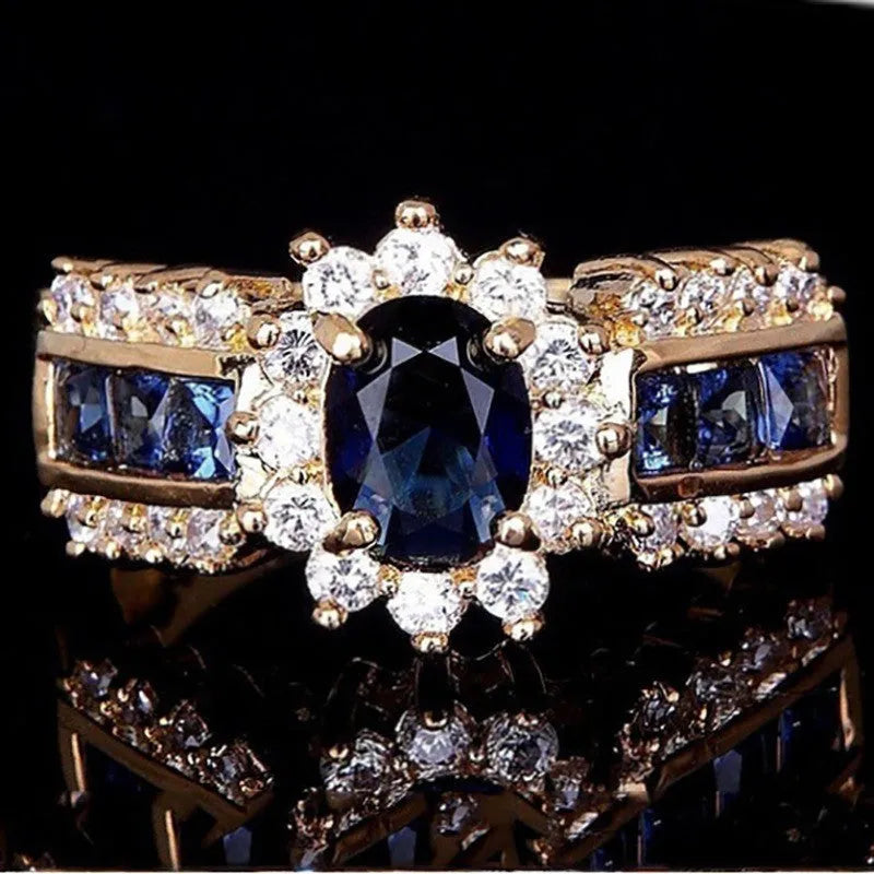 Personalised diamond-treated zinc alloy rings in blue and purple designs with size options 6-11
