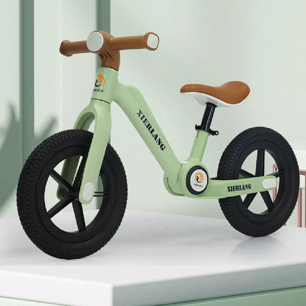 Foldable kids balance bike in grass green, light brown, or pink purple