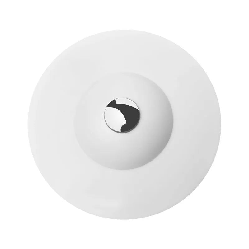 UFO-style silicone press sink drain cover in white, pink, gray, blue, and green