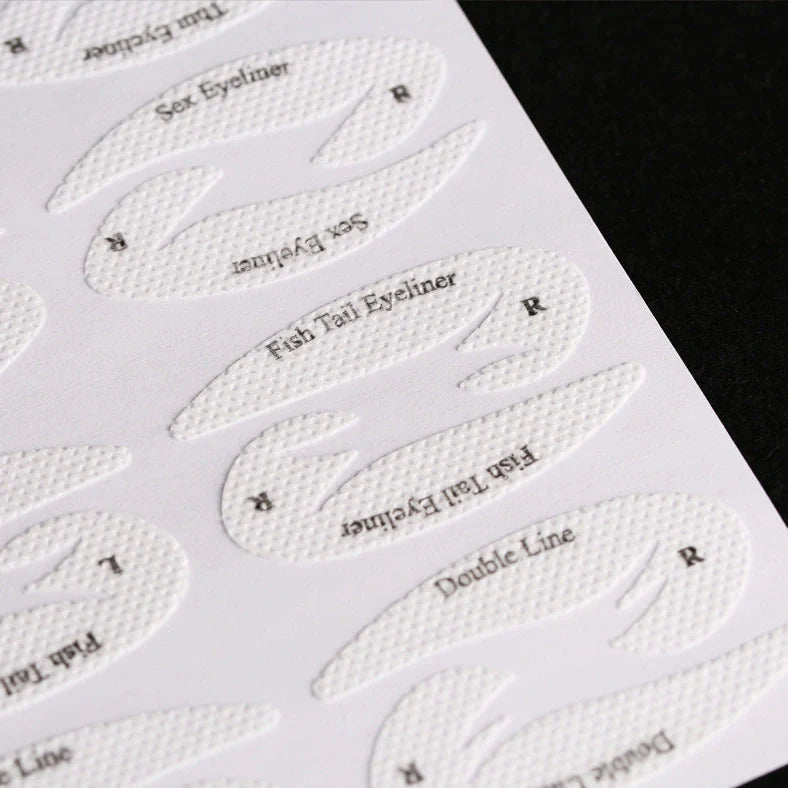 Eyeshadow eyeliner makeup template sticker showing 155mm × 125mm dimensions and non-woven fabric construction