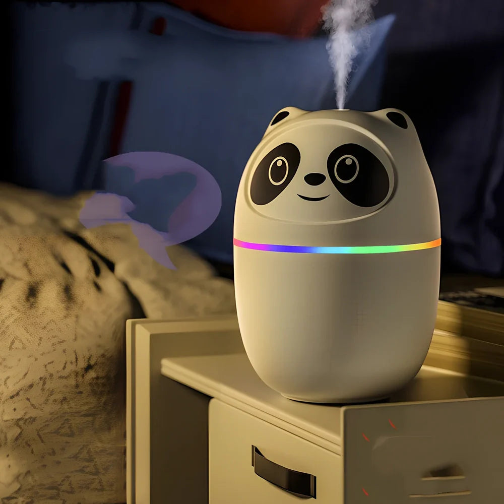 White USB mini humidifier on desk emitting mist with night light glow, 75x75x116mm size for office aromatherapy