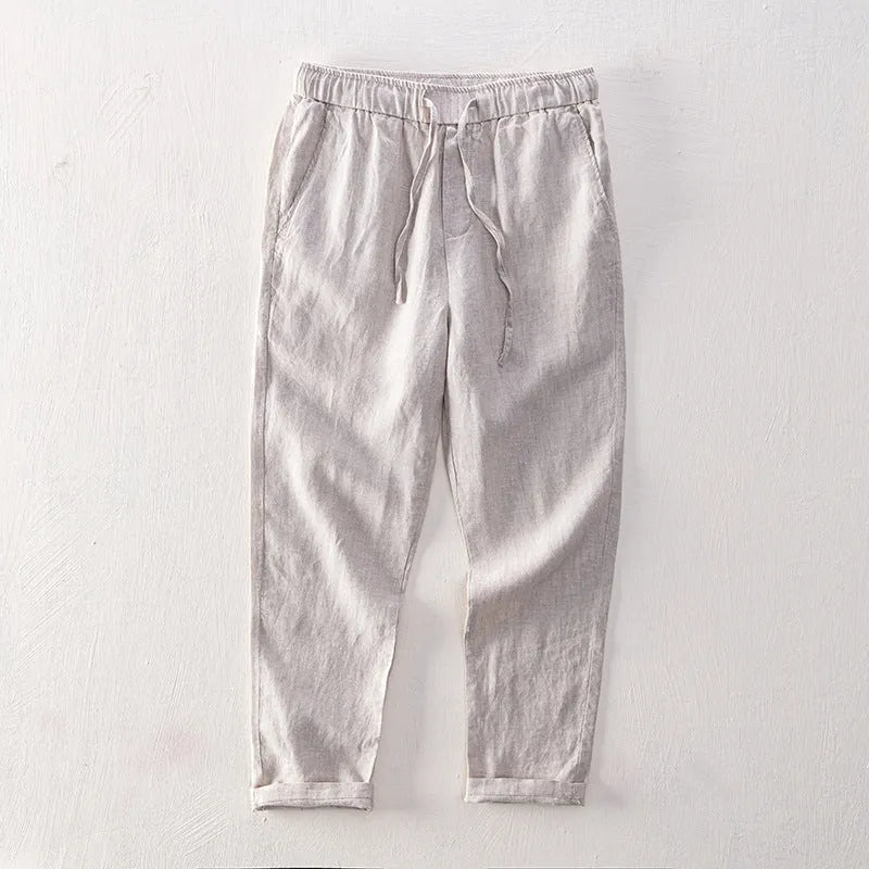 Men's straight linen trousers in four colour options showing mid waist and straight-leg cut