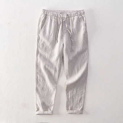 Men's straight linen trousers in four colour options showing mid waist and straight-leg cut