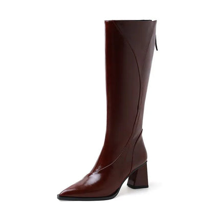 Women's black retro high heel riding boots with a waterproof platform and cowhide upper.