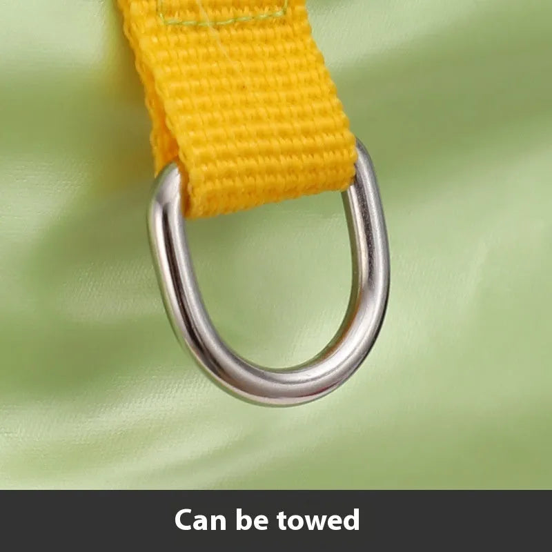 Green waterproof four-legged dog coat on pet showing full coverage design