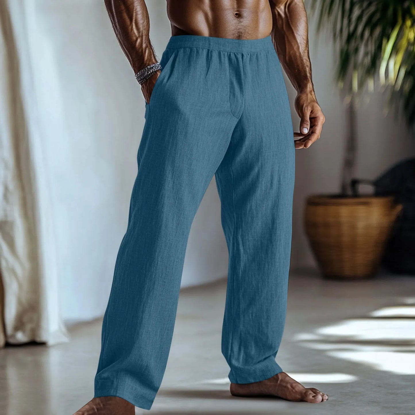 Straight leg cotton linen trousers in light green, shown with side pockets and a casual fit.