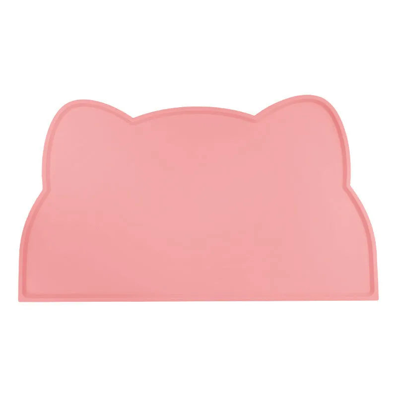 Solid-colour silicone pet feeding mat with cat head design measuring 44 by 24 centimetres