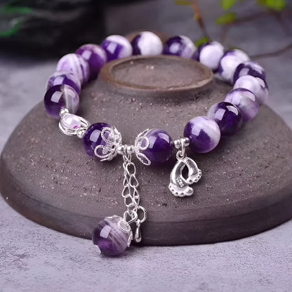Amethyst bracelet with 10mm round violet beads on elastic string