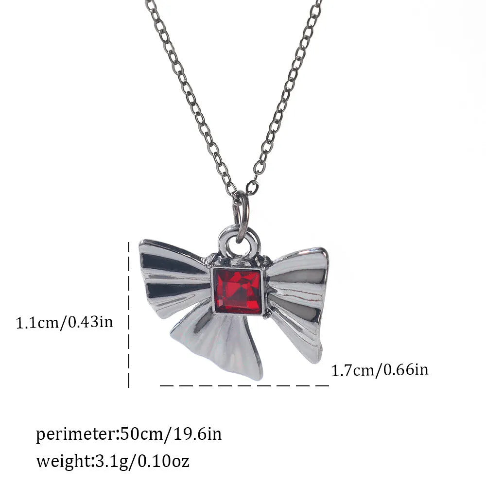 Dark gothic necklace with detailed spider bat pendant on an adjustable metal chain