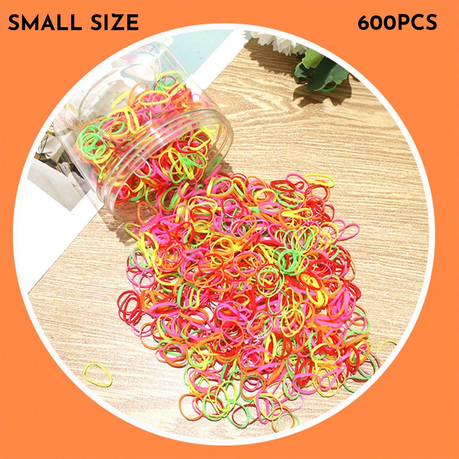 Assorted colourful thin TPU baby hair ties for toddlers and kids in a reusable plastic storage container.