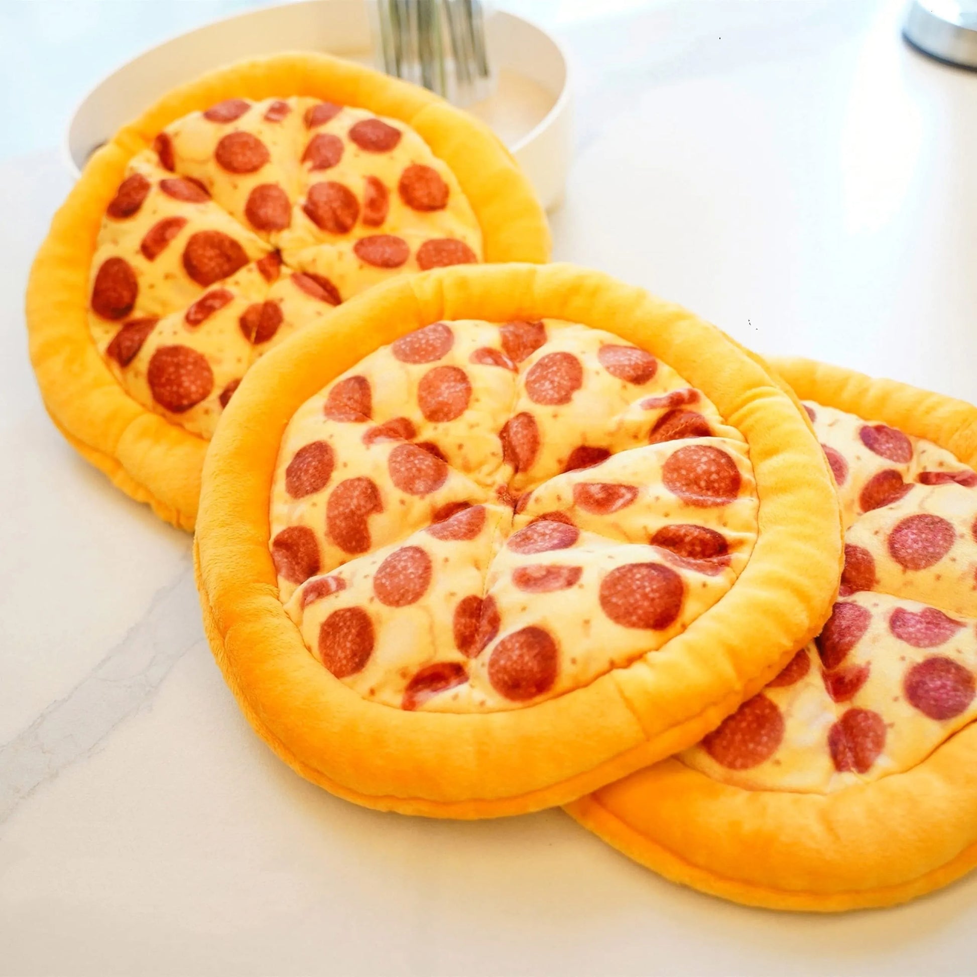 Yellow pizza slice dog chewing toy with teddy bear texture and squeaker