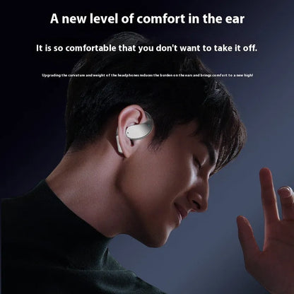 Beige and black sports Bluetooth earphones with a hanging ear design, shown with a digital display.