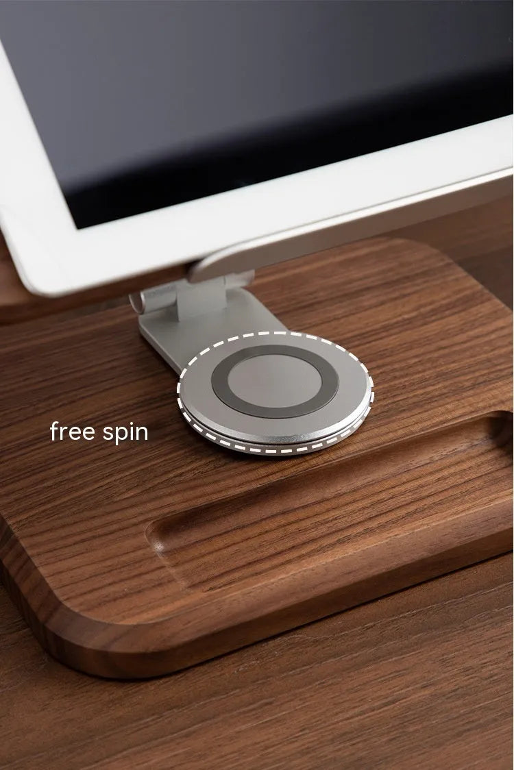 Walnut coloured solid wood adjustable reading rack with rotating base holding a book