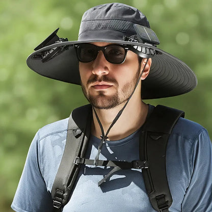 Solar-powered fan hat for men with a wide brim and adjustable chin strap, shown in a neutral colour.