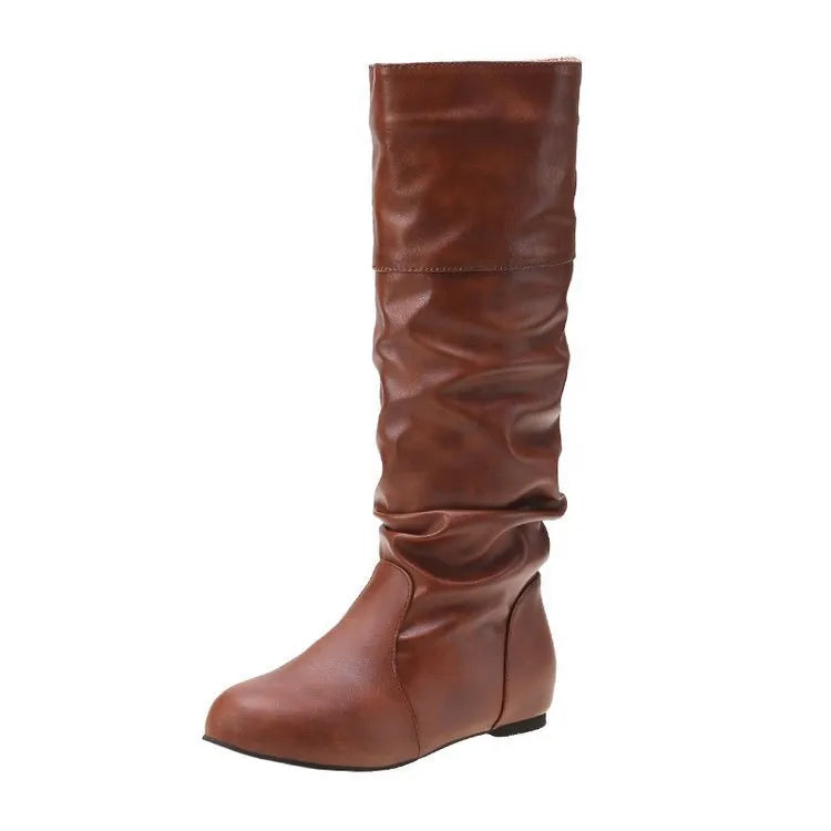 Women's flat heel long boots in black, slip-on style with a high cylinder shaft and rubber sole.