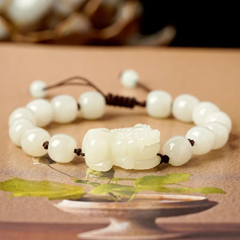 Hetian jade bracelet with black and red adjustable ropes in traditional Chinese design