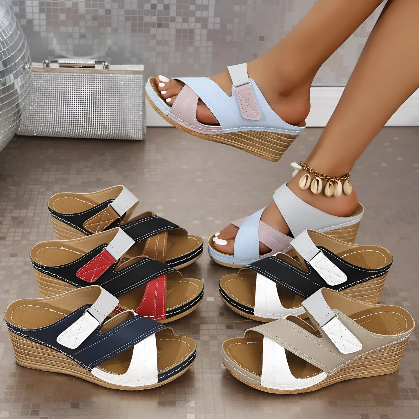 Women's black and red platform wedge slippers showing velcro strap and fish mouth toe design