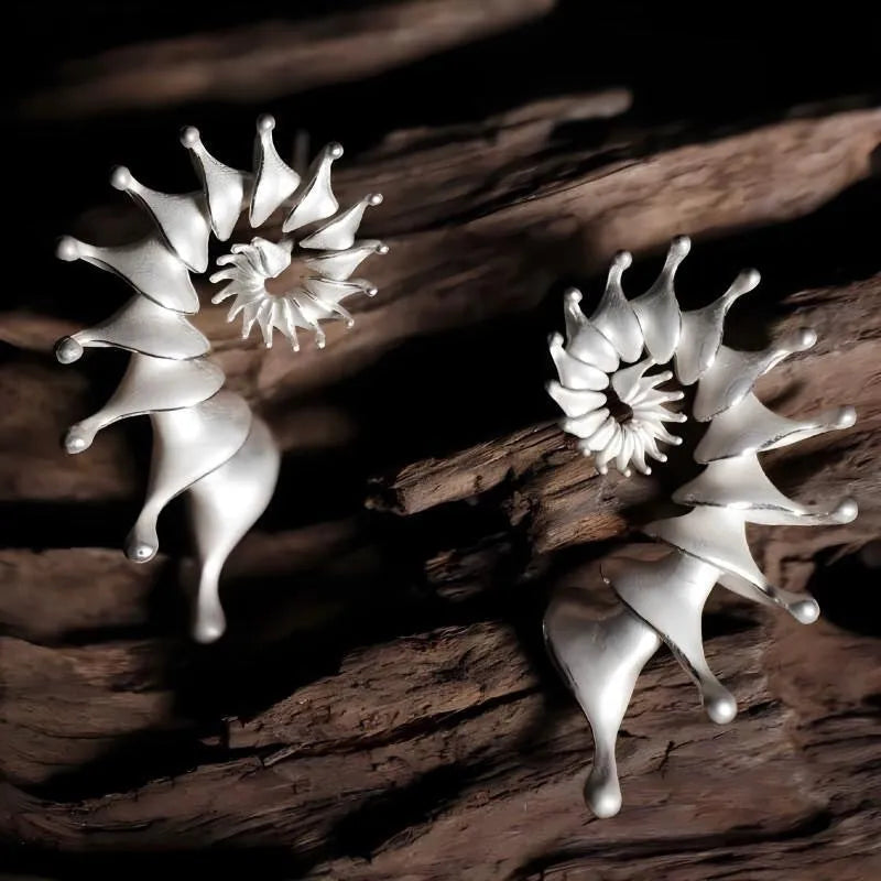Matte finish conch shell stud earrings with three-dimensional design in alloy metal