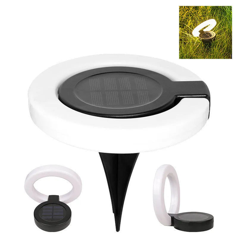 Solar-powered waterproof underground garden light showing its low-profile design and solar panel.