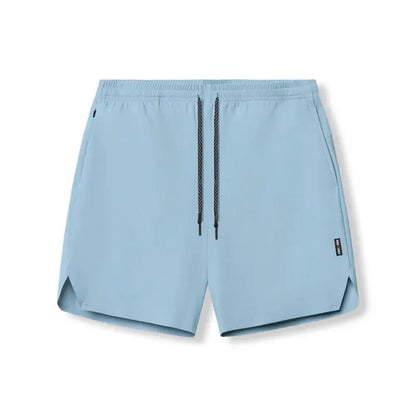 Men's seamless grey sports shorts in straight leg, knee-length quick-dry polyester design.