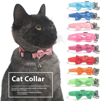Adjustable nylon cat collar with bell decoration in striped pattern, multiple colour options available