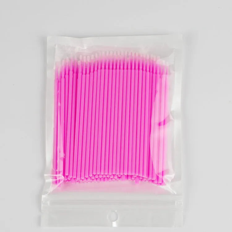 Disposable micro applicator brushes with coloured plastic handles and bendable cotton swab tips