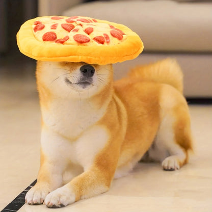 Yellow pizza slice dog chewing toy with teddy bear texture and squeaker
