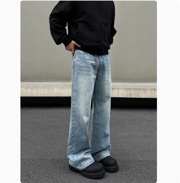 Men's straight leg jeans in washed blue with whisker distressing, featuring a flared leg cut, regular thickness cotton blend fabric with zipper fly, medium-high waist and fitted straight tube style suitable for all seasons with visible stitching detailing