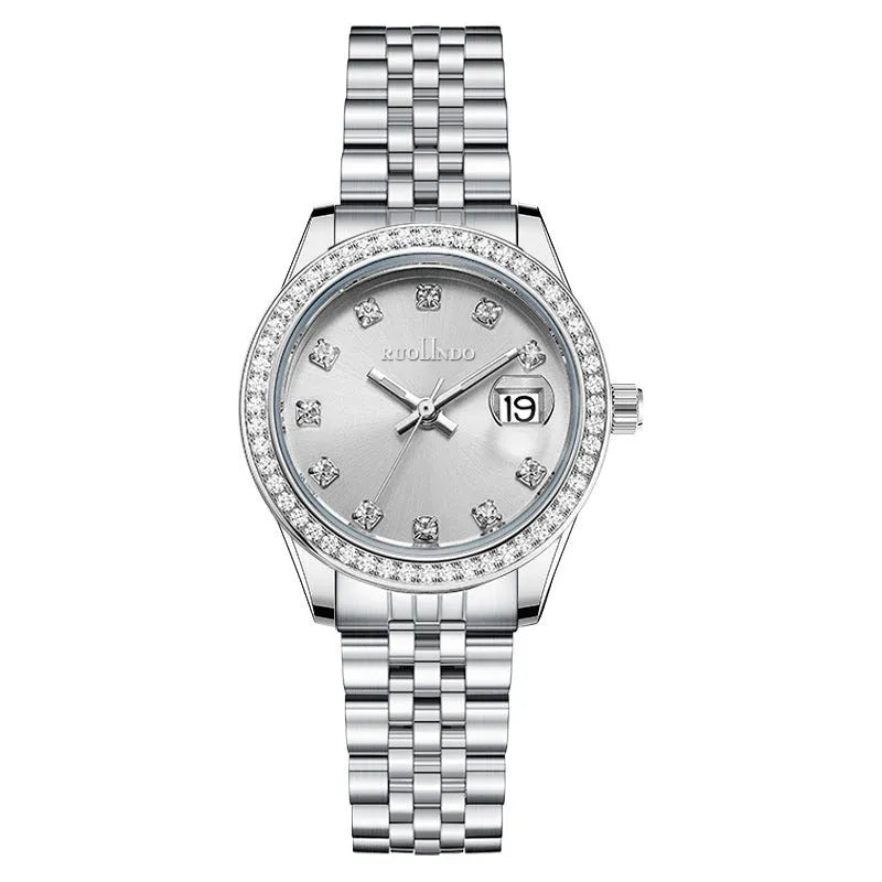 Women's silver alloy quartz watch with circular dial and stainless steel folding buckle.