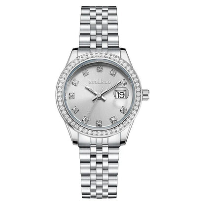 Women's silver alloy quartz watch with circular dial and stainless steel folding buckle.