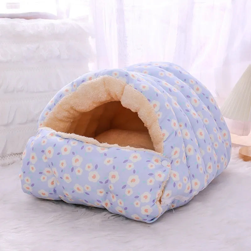 Enclosed winter cat nest with removable cover in a small blue flower print pattern.