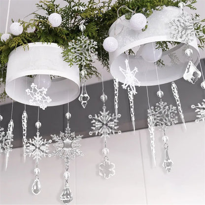 Ten clear acrylic icicle Christmas tree ornaments with hanging holes and white ribbon on pine branches
