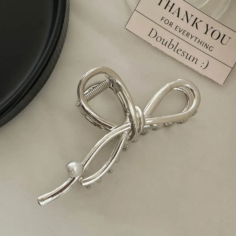 Silver metal hair claw barrette example from a range of 44 Korean-style designs.