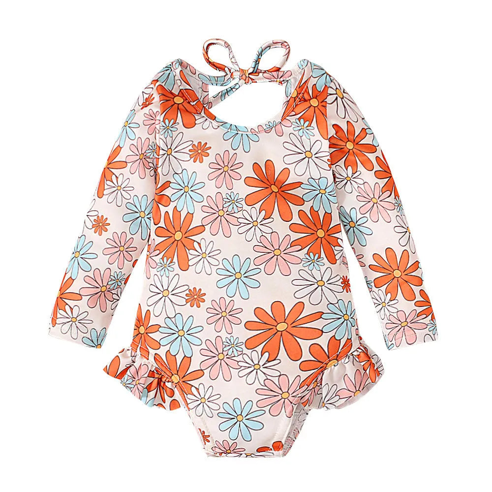 Girl's floral print swimsuit with open back crew neck design in polyester fabric