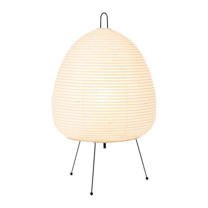 Japanese style table lamp with a white handmade rice paper shade on a slim aluminium base.
