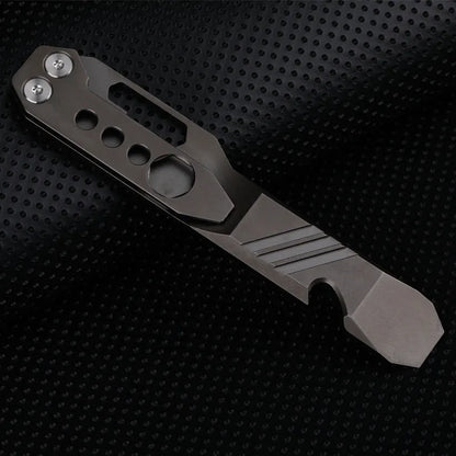 Titanium alloy multi-function crowbar tool with bottle opener on a stone wash finish background.