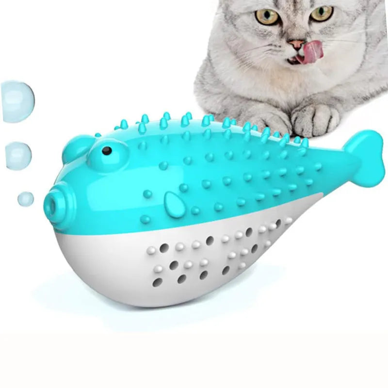 Mint Toys blue silicone fish-shaped cat chew toy on a wooden floor.