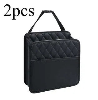 Black leather hanging storage bag for car interior organisation and trash.